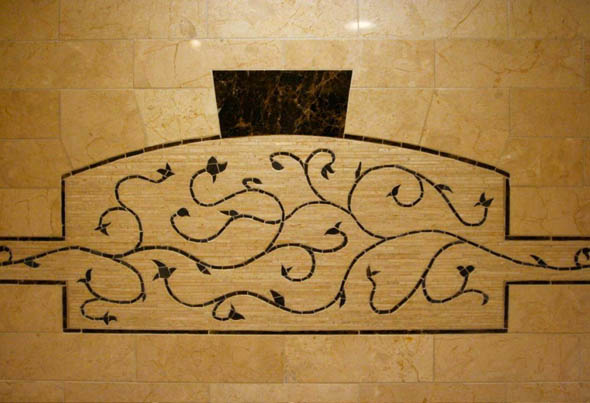 Glass tile and marble mosaic shower